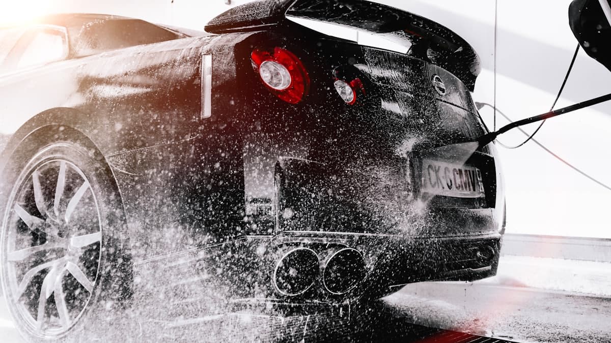 Snow foam covering the rear of a car